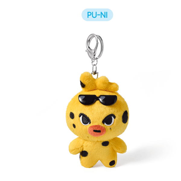 Yellow plush keychain with black accents on a white background