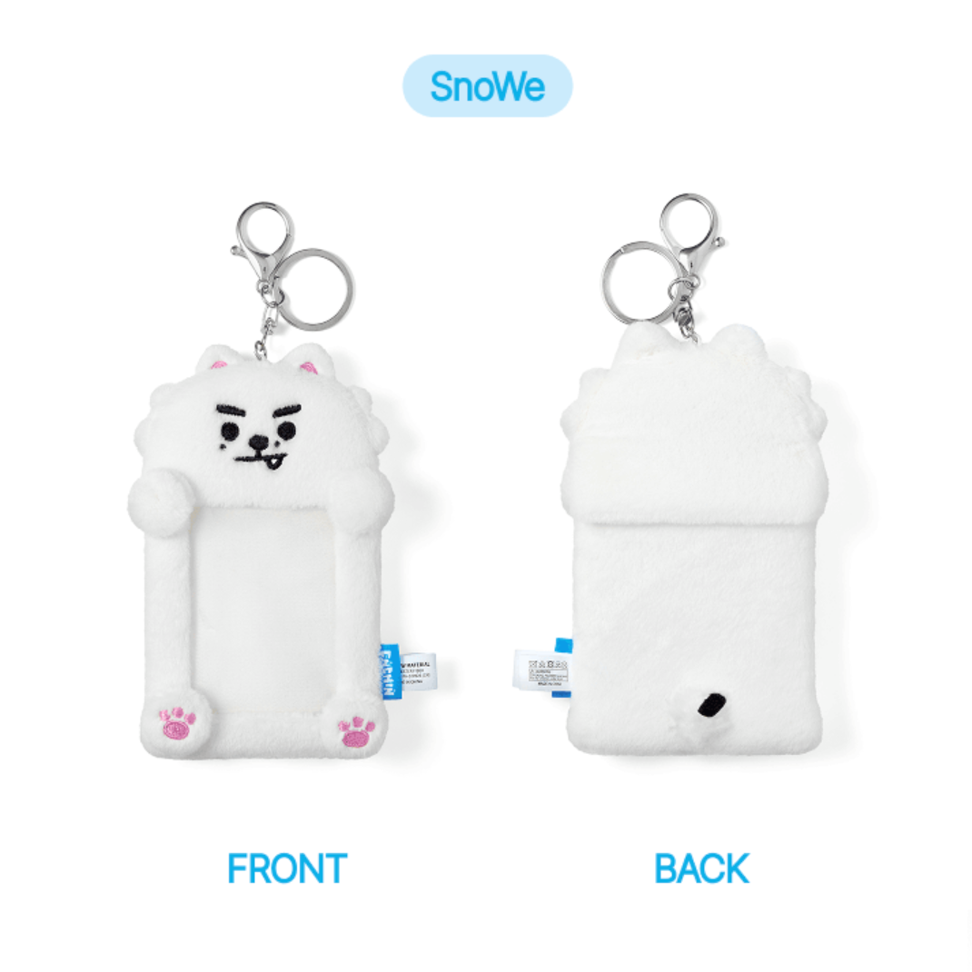 White dog-shaped keychain with front and back views on a white background, featuring the brand 'SnoWe'.