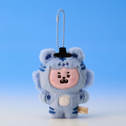 Plush keychain of a character in a blue outfit with a black hat on a blue background