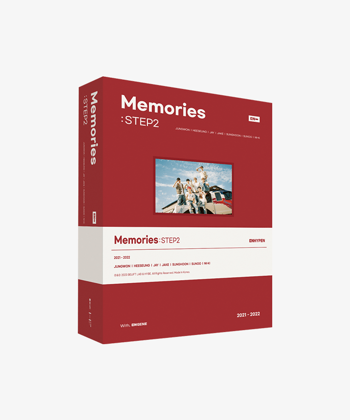 Red and white packaging for 'Memories STEP2' with a photo of four people on a boat.