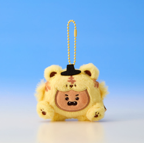 Plush keychain with a cartoon character on a blue background