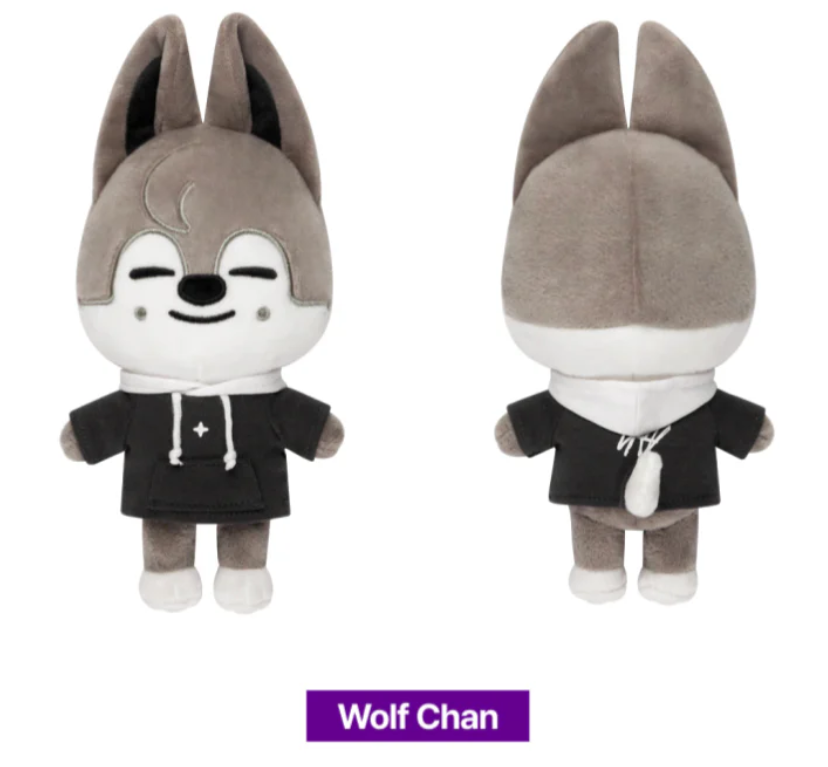 Plush toy resembling a wolf character in a black outfit with 'Wolf Chan' branding.